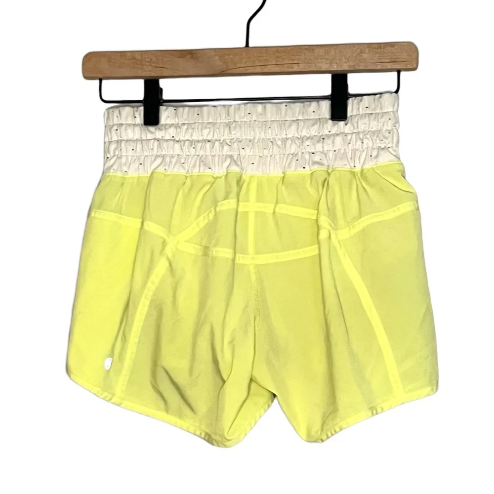 Lululemon Tracker Yellow Shorts with Multicolored Dot patterned waistband